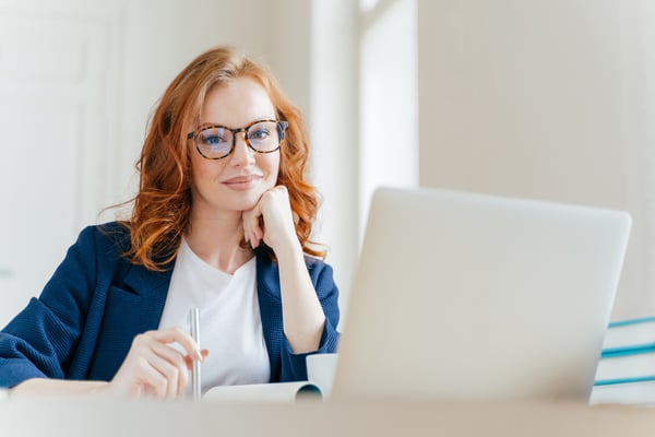 Female Part-Time Attorney Working Remotely on Computer